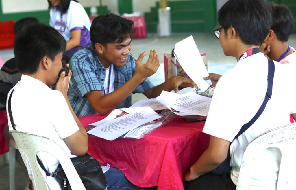 Participants from the Philippine Science High School-Caraga read the program written in the Butuanon language on Friday, 26 April 2024, during the first day of the Butuanon Language Camp. MindaNews